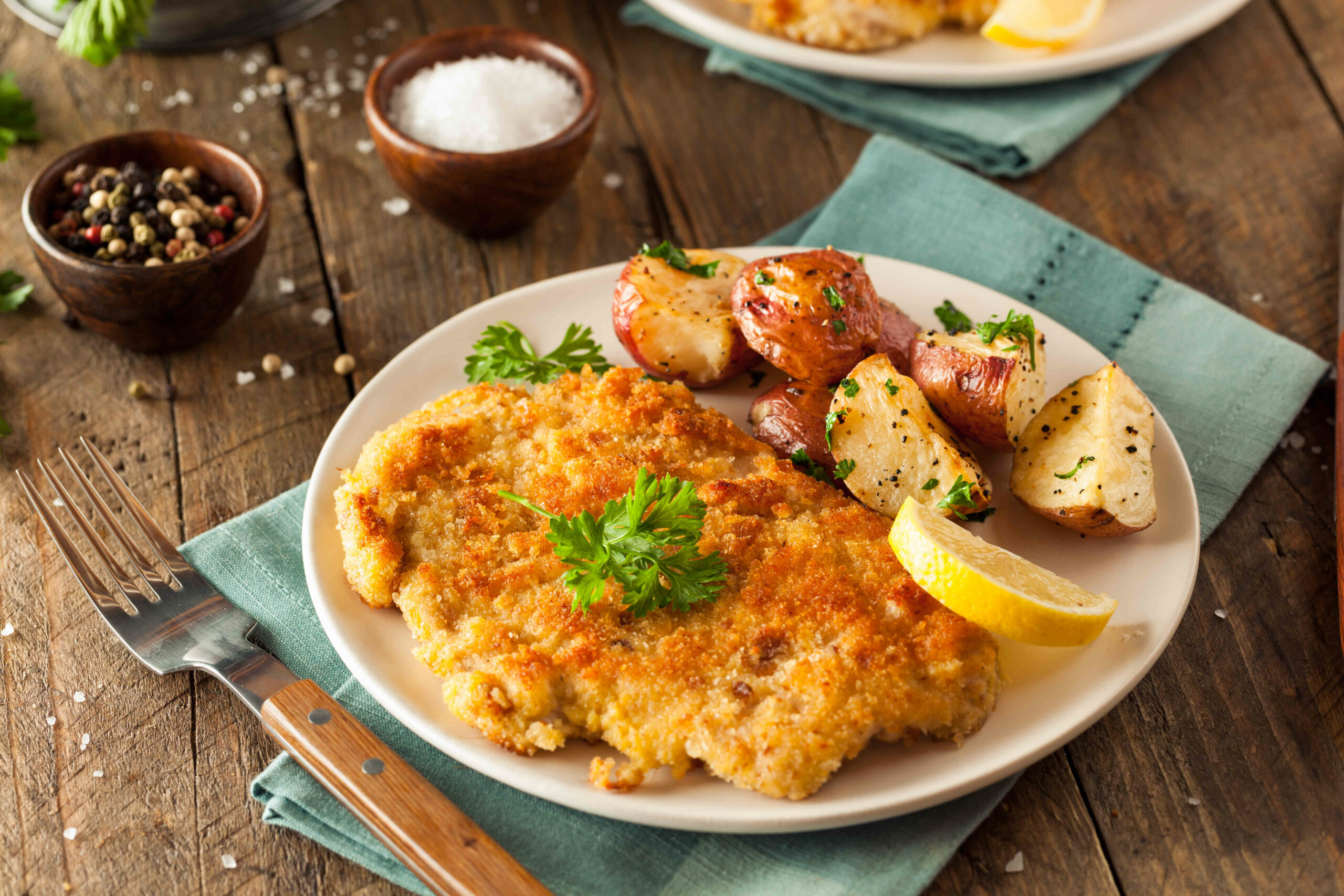 Homemade,Breaded,German,Weiner,Schnitzel,With,Potatoes