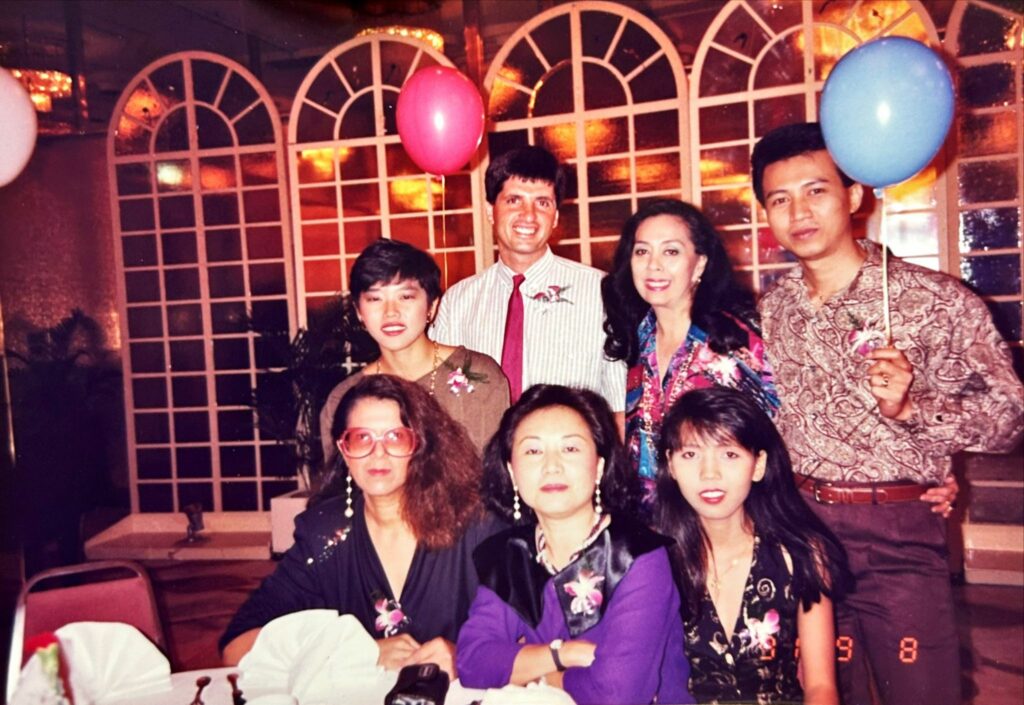 Betty (in purple) and her colleagues at the Club's annual Employee Dinner & Dance in 1991