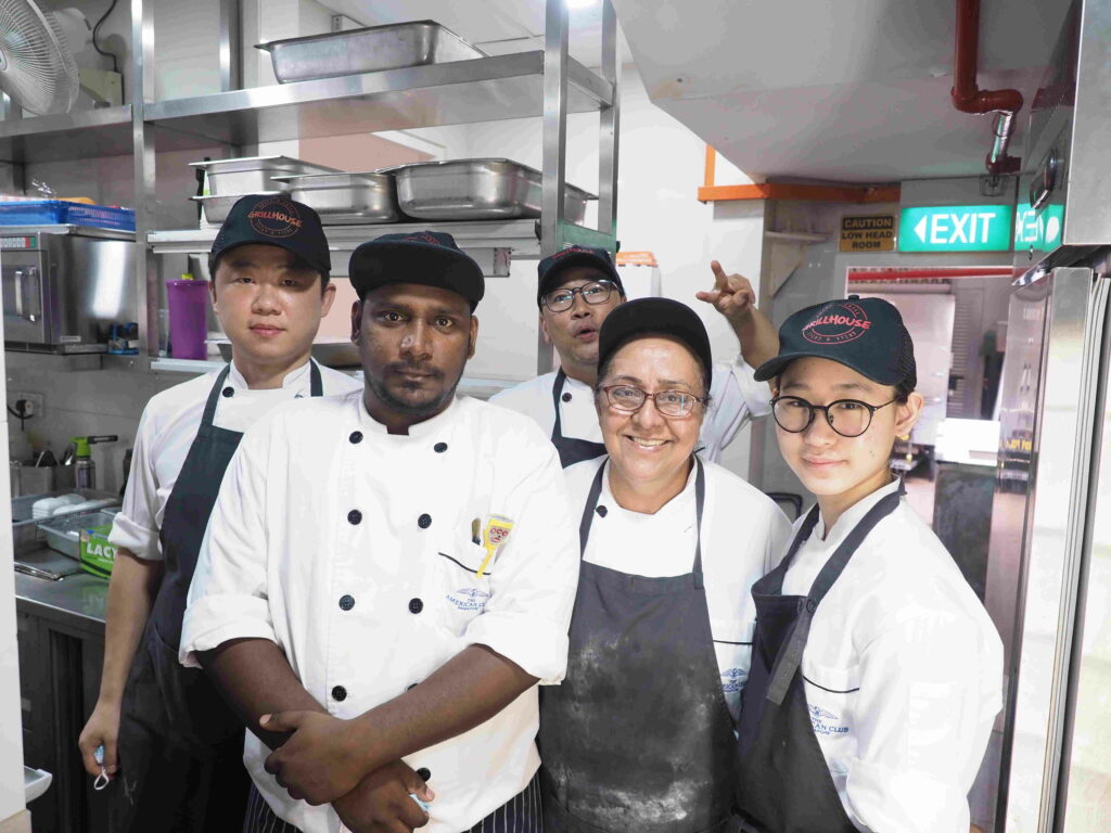 Satwant (second from the right) and her team mates at Grillhouse
